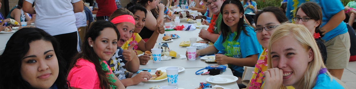 Students eating at a block party