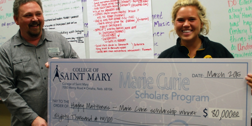 Hayley Matthews of Glenwood, Iowa, accepts the $80,000 Marie Curie Scholarhip to College of Saint Mary.