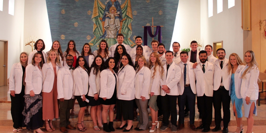 College of Saint Mary physical therapy students received white coats during Clinical Commencement Ceremony