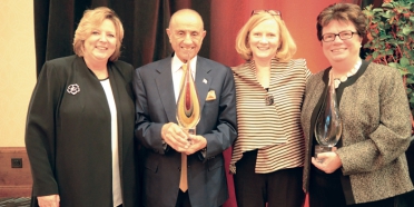 Dr. Maryanne Stevens and others with the award