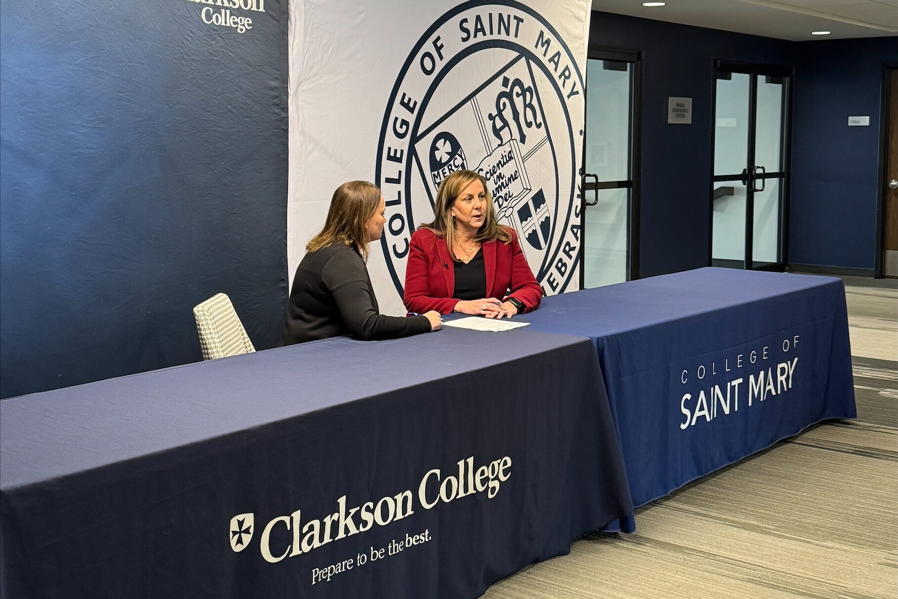 Andreia Nebel, Clarkson College president, and CSM President Heather Smith.