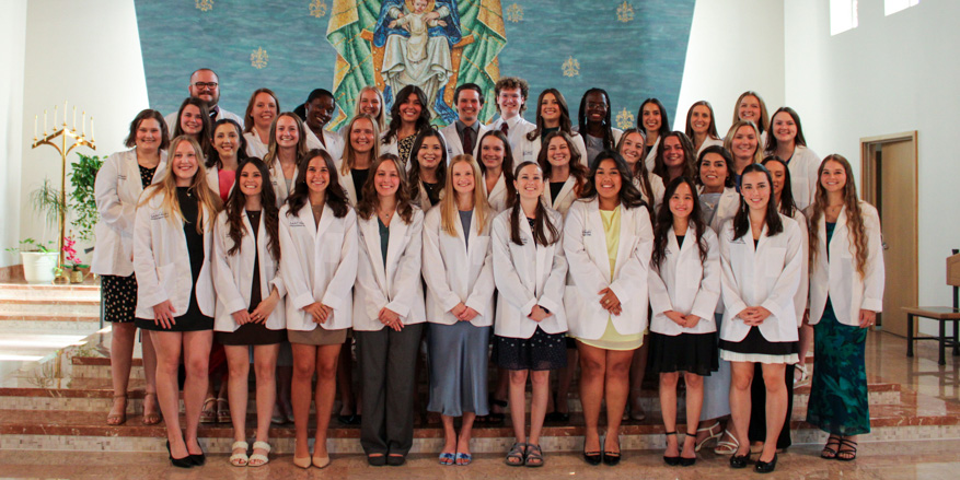 Physician assistant students at white coat ceremony