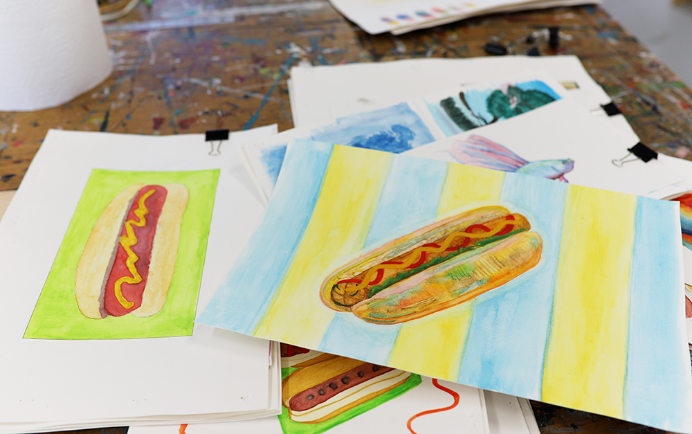 watercolor painting of hotdogs