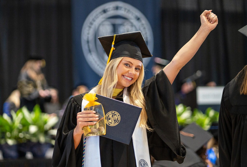 graduate celebrating