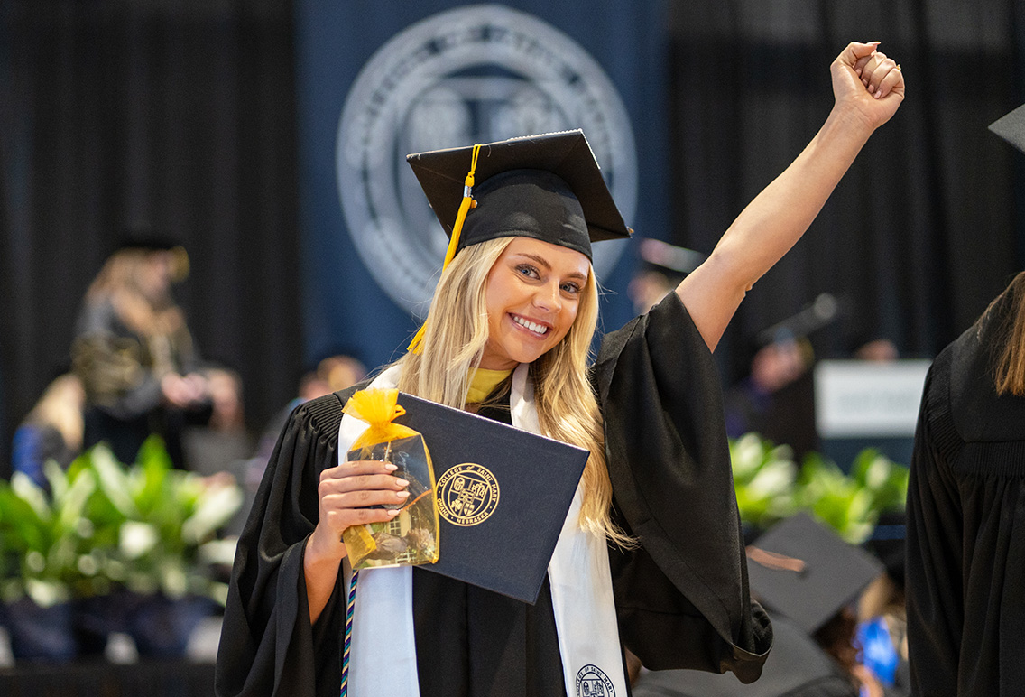 graduate celebrating