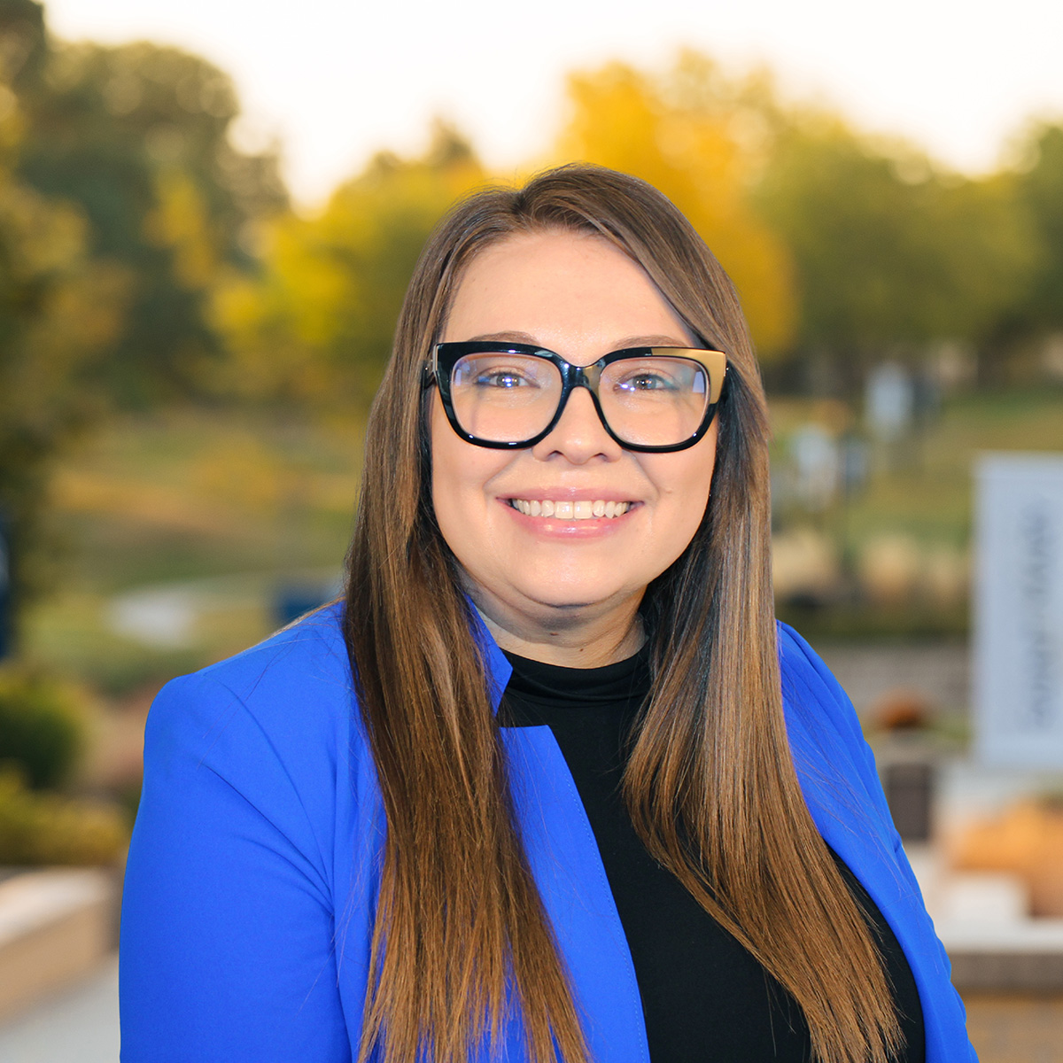 Headshot image of Ashley Adkins.