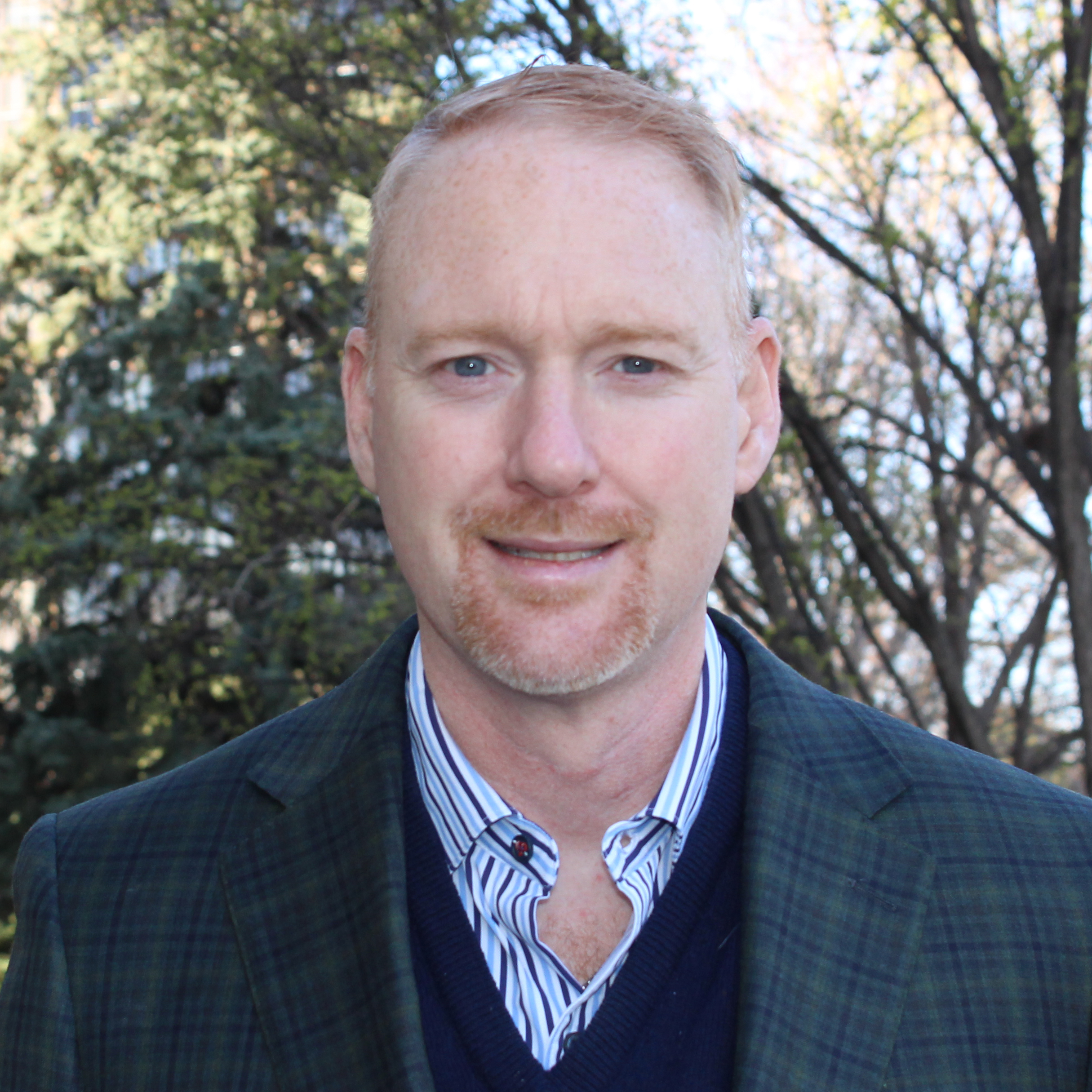 Headshot image of Josh Evans.