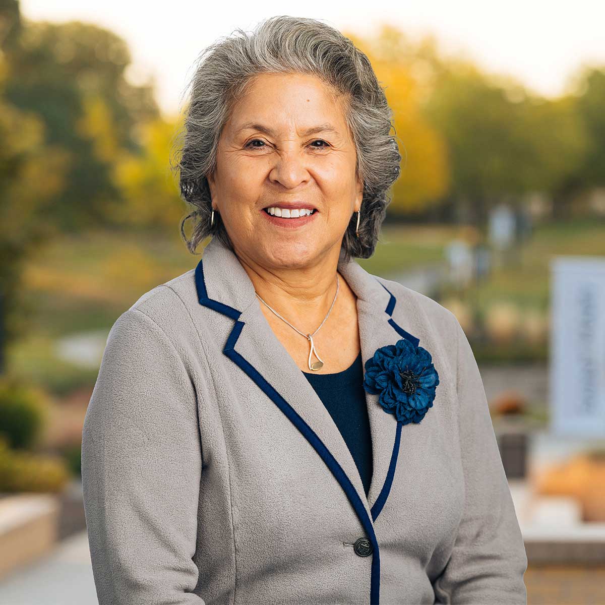 Headshot image of Anne Mejia-Downs.
