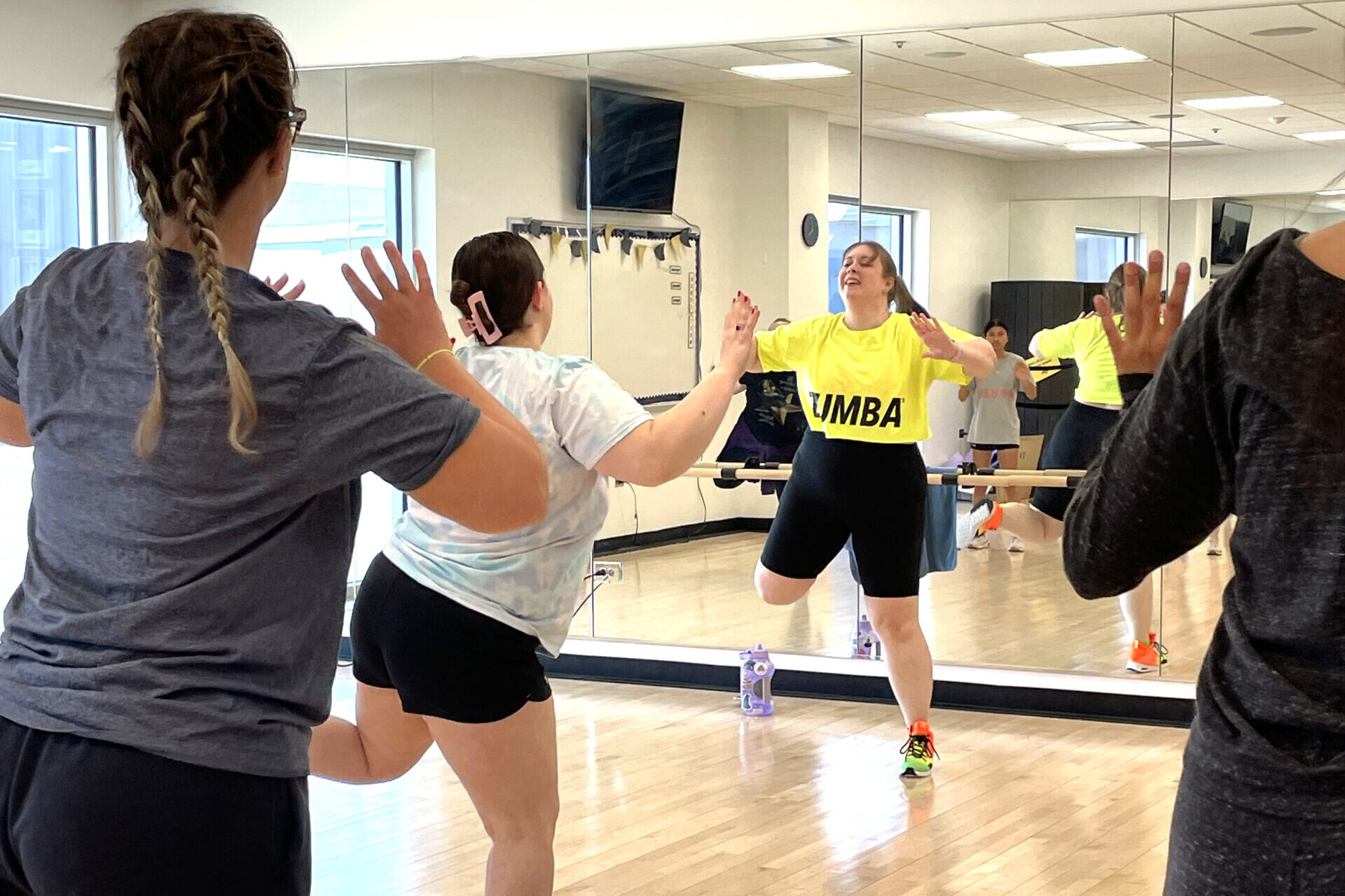 Emily Kahm teaching body positive Zumba on campus