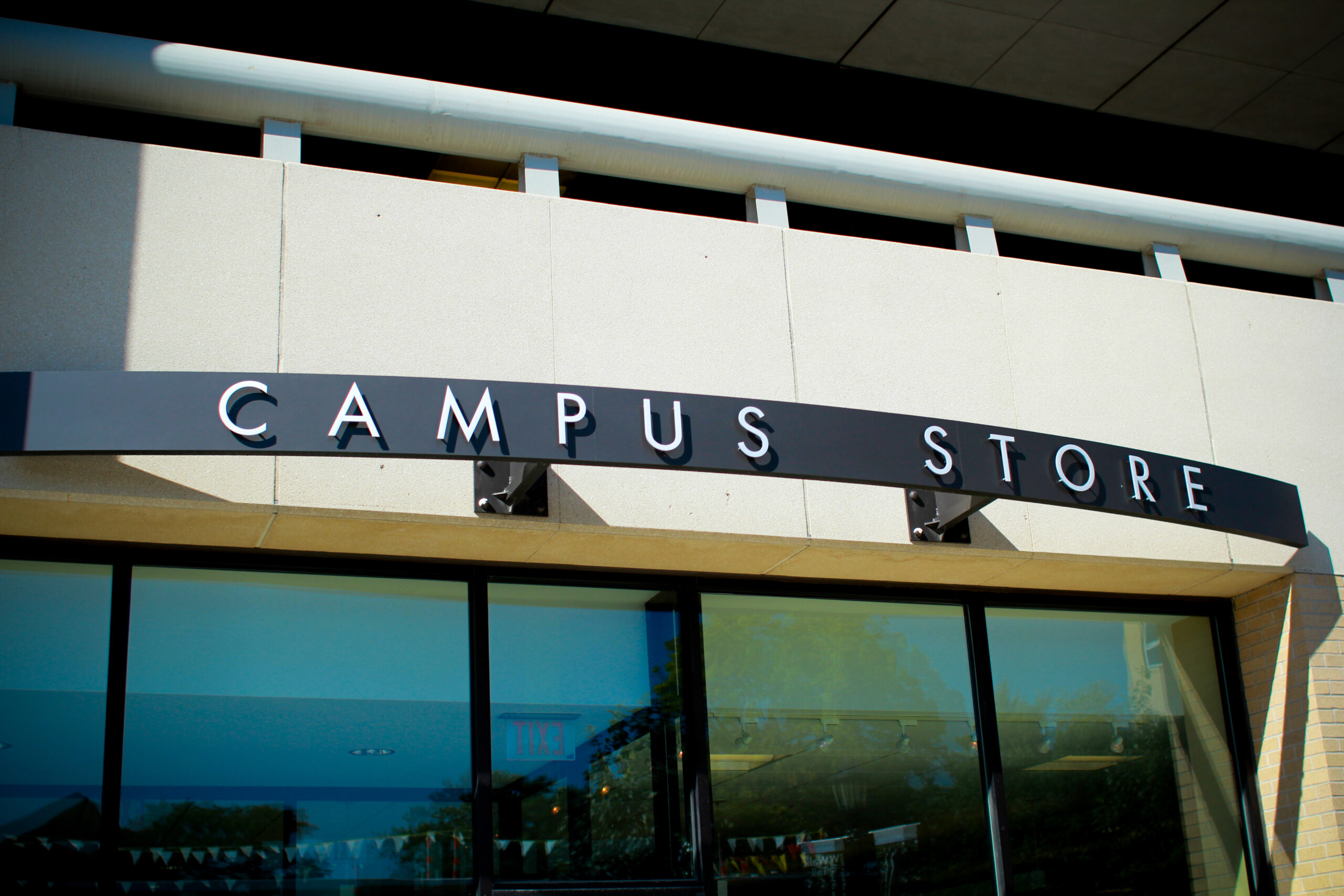 Exterior of the College of Saint Mary Campus Store with signage above the storefront windows.
