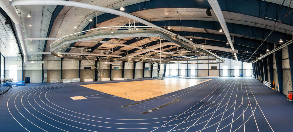 Interior panoramic view of Lied Fitness Center and Fieldhouse track and basketball court.