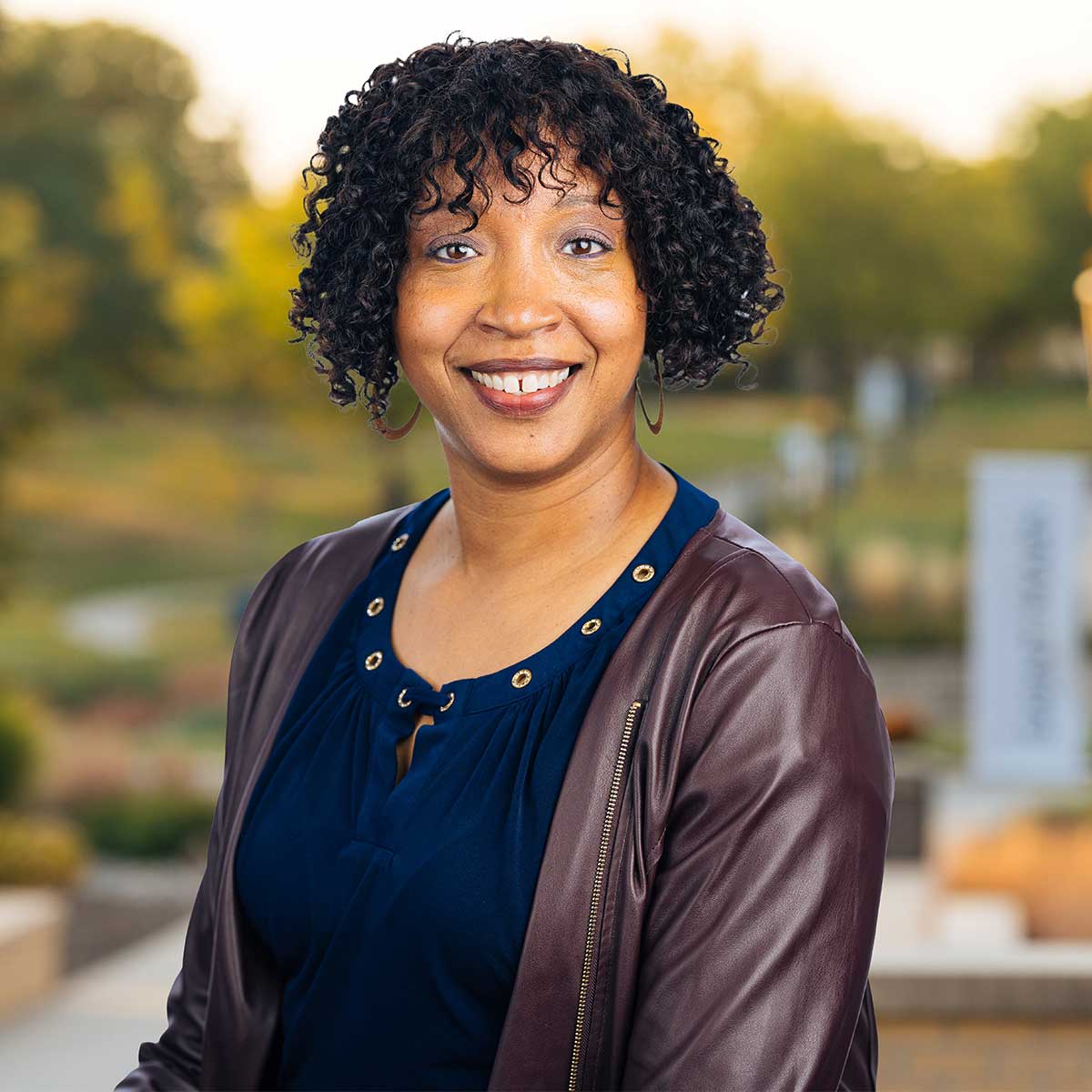 Headshot image of Mica Mitchell.