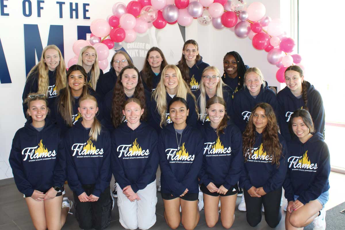 group of CSM student athletes smiling at camera